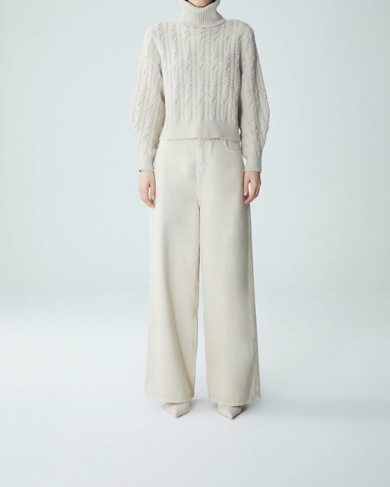 Front of a model wearing a size L Montgat Londrina Pullover Sweater in Sand in Sand by Maria Cher. | dia_product_style_image_id:364150